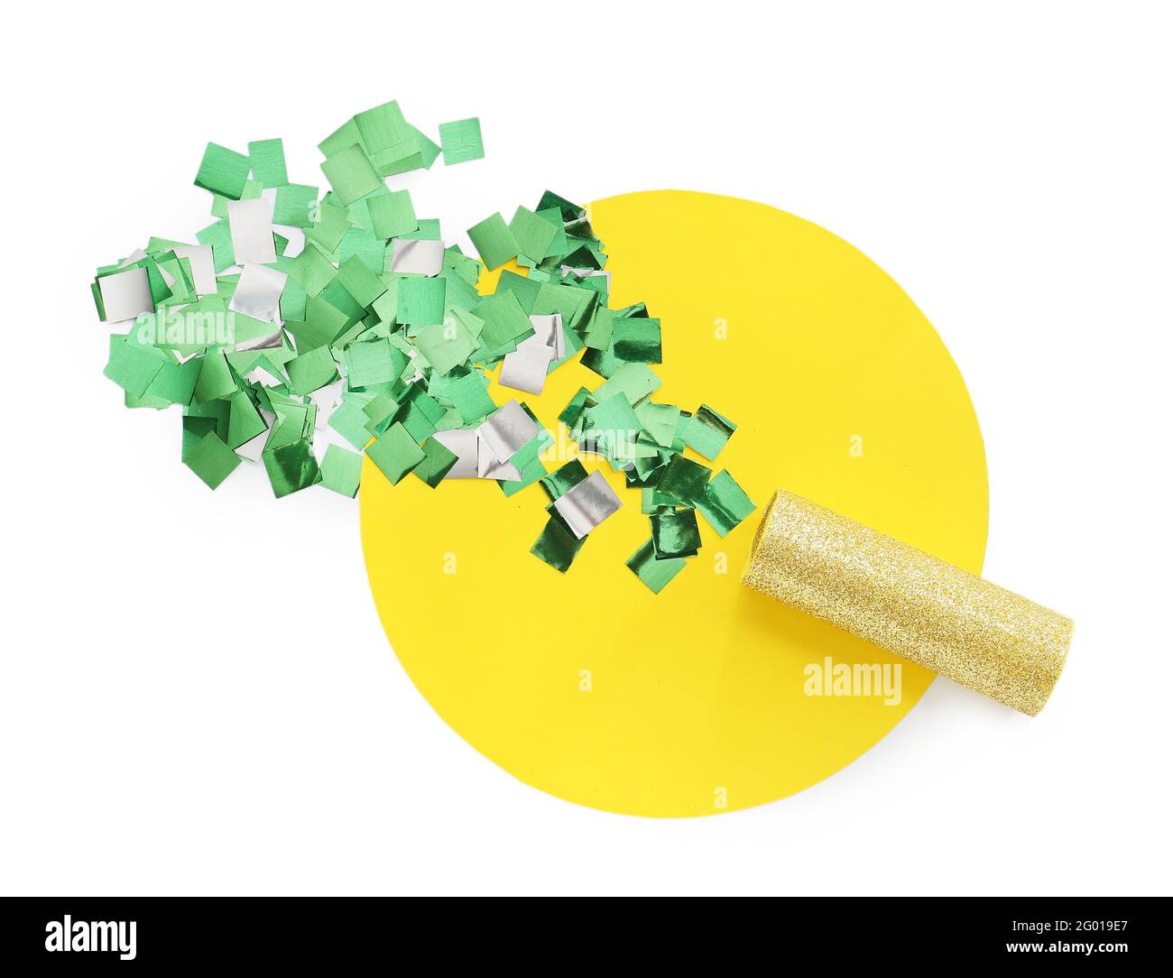 Confetti and party popper on white background Stock Photo Alamy