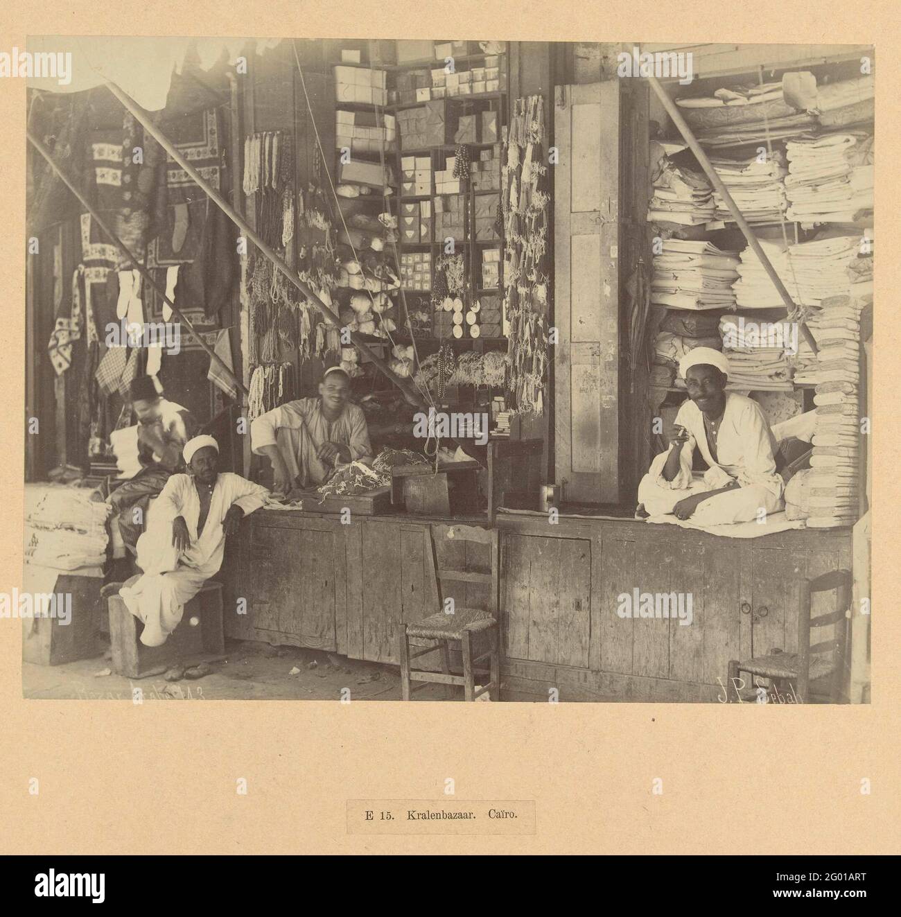 Beads and fabric stall with sellers in Cairo; E 15. Beading bazaar