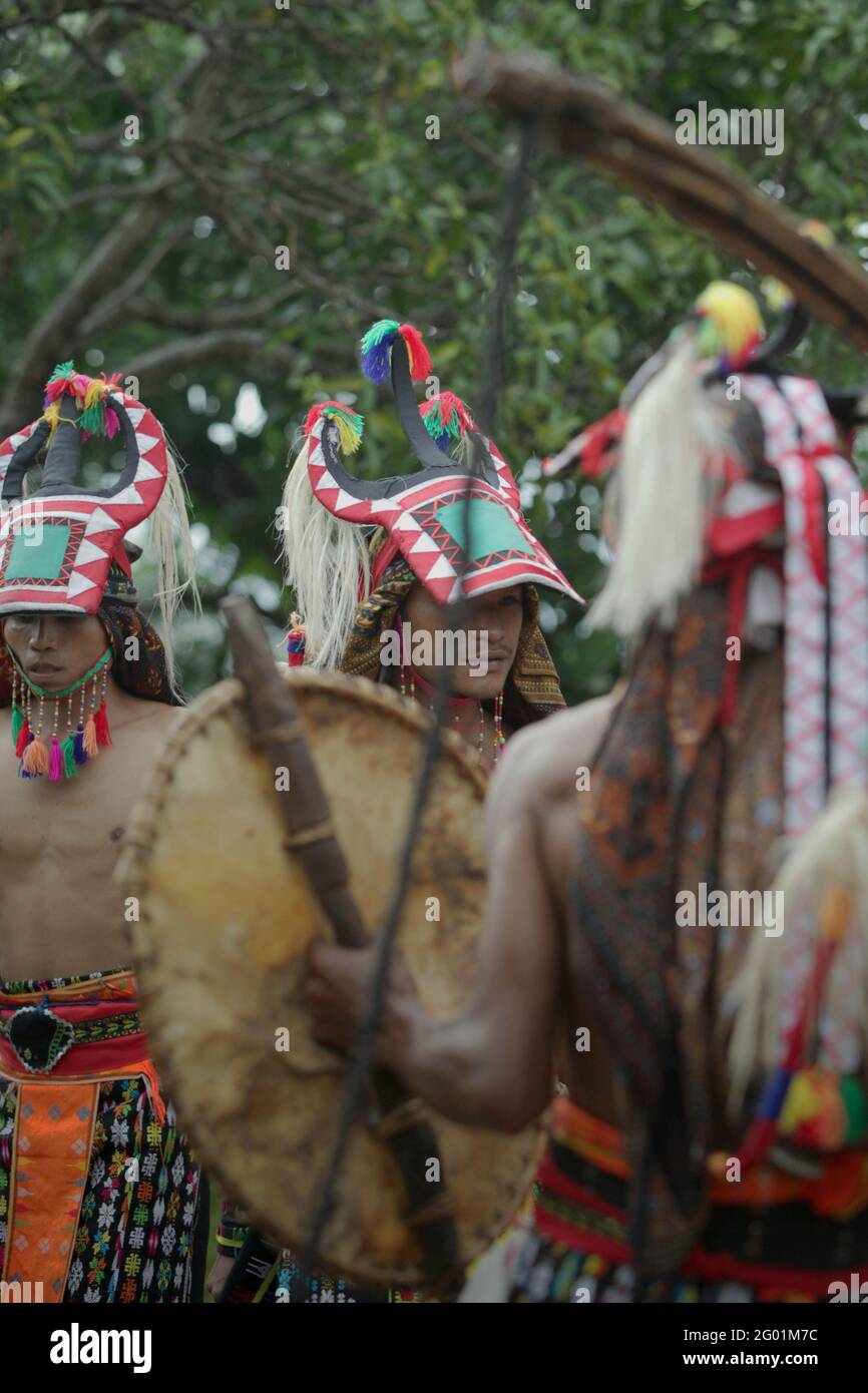 Performers of 'caci' (Flores Island's traditional whip fight, martial art) in Liang Ndara village, Mbeliling, West Manggarai, Flores, East Nusa Tenggara, Indonesia. Stock Photo