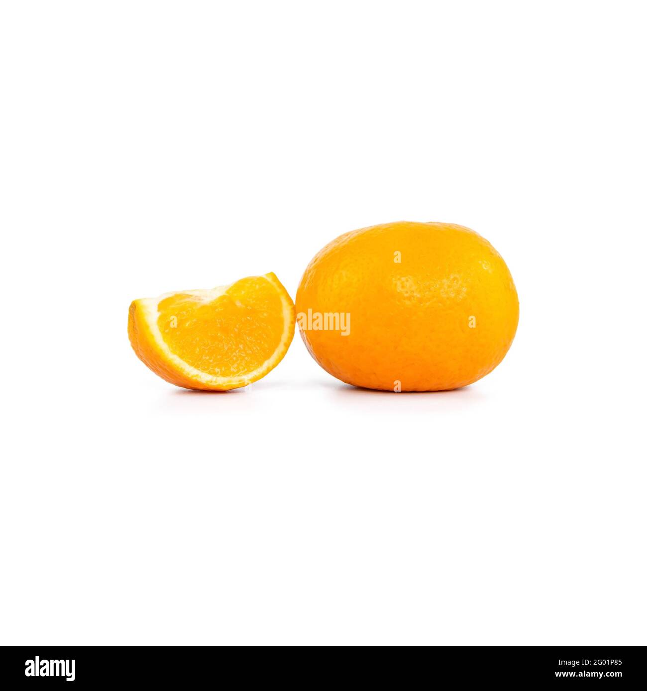 One tangerine or orange and one sliced ​​orange on white background Stock Photo