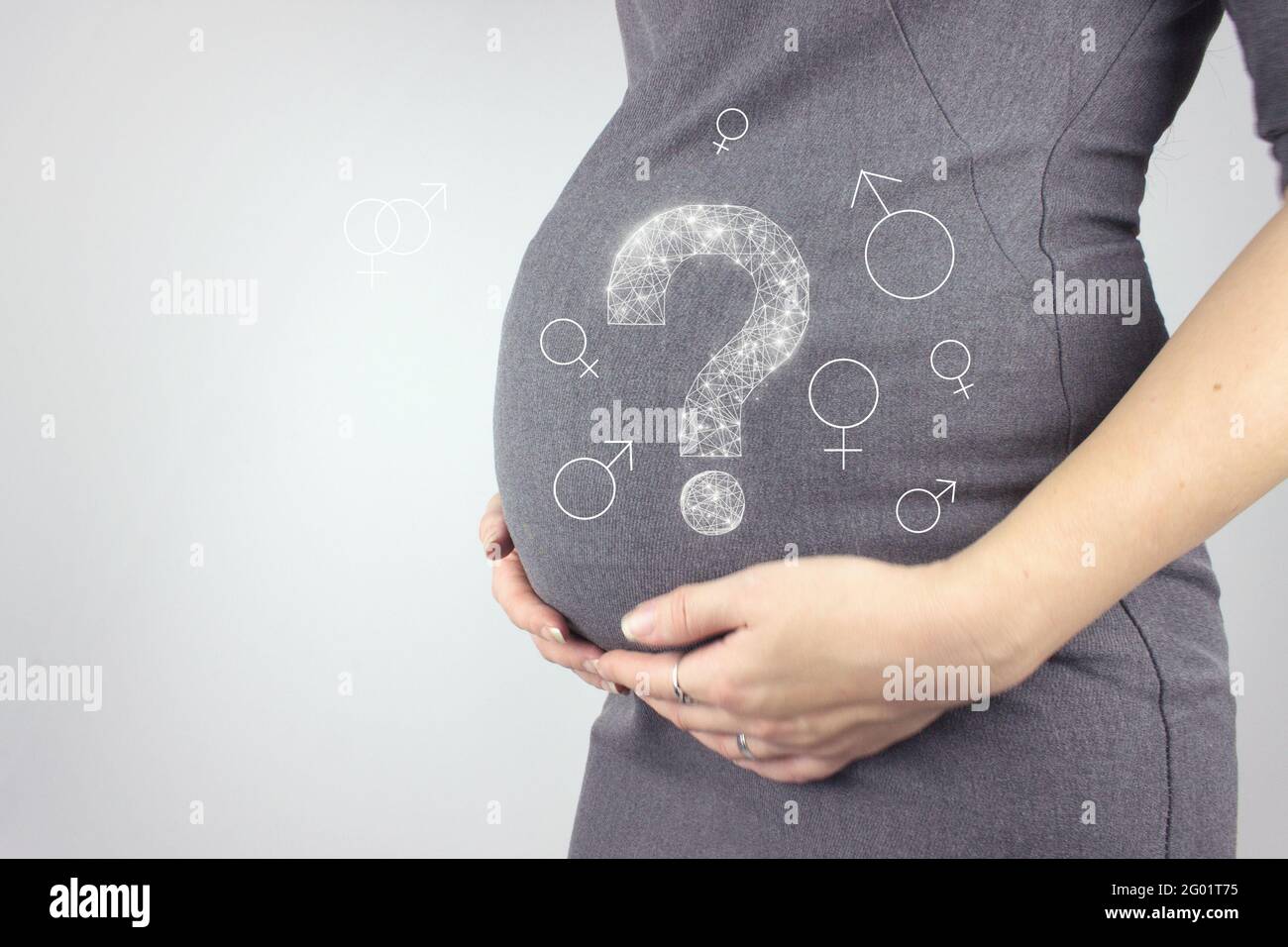 Close up of pregnant woman's belly with hologram question mark. Pregnancy, maternity concept. Stock Photo