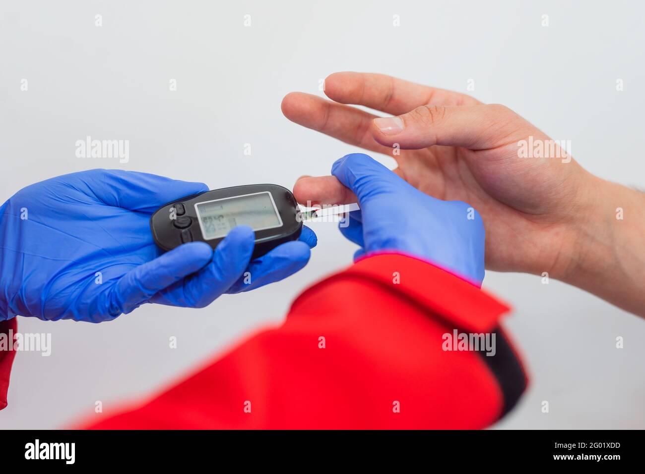 Doctor checking blood sugar level with at table. Diabetes test Stock Photo Alamy