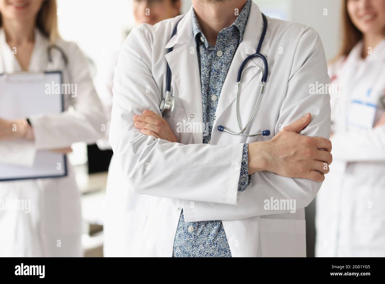 Medical team in coat hi-res stock photography and images - Alamy