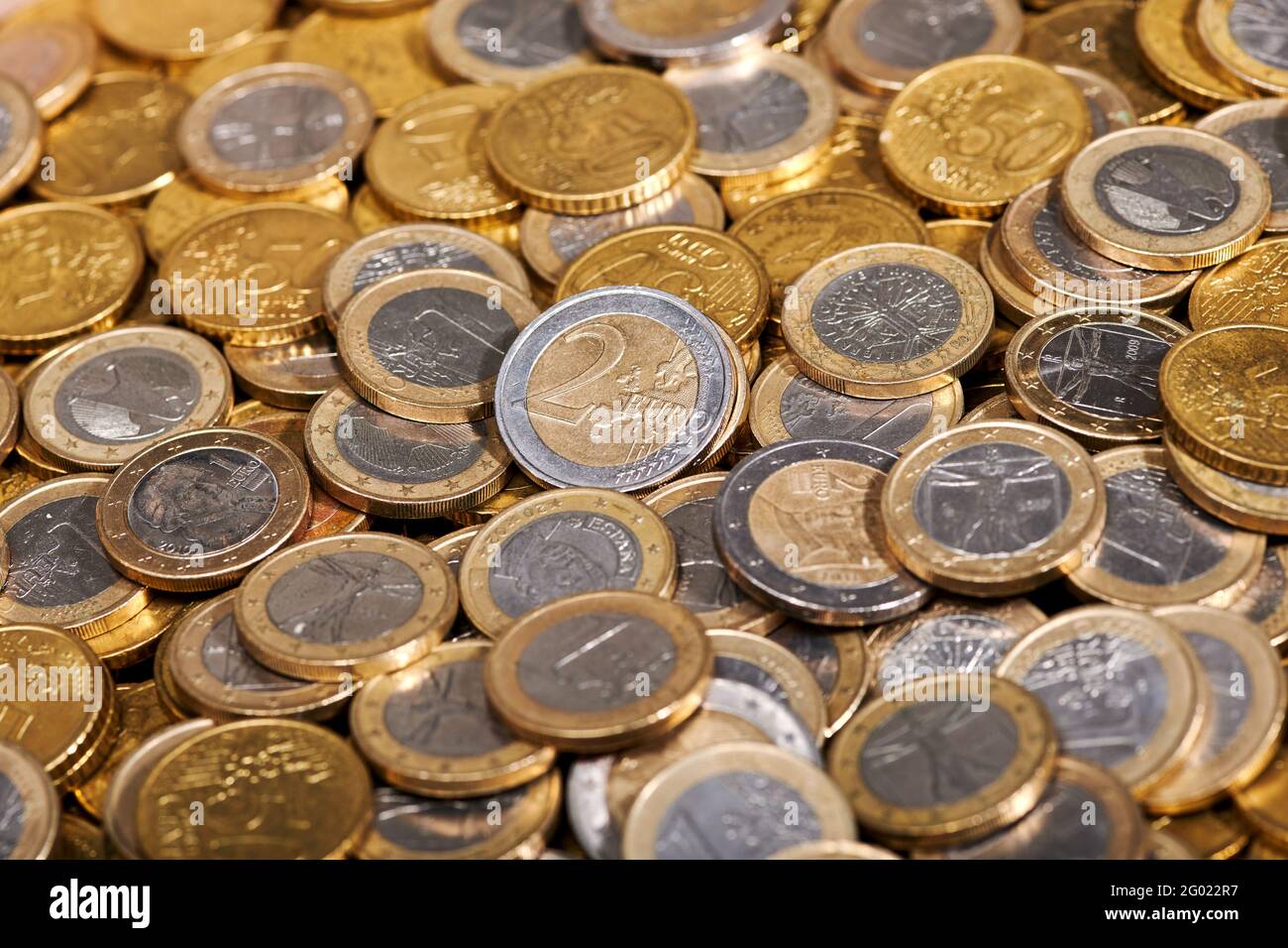 From above shiny 2 euro coin placed on pile of money in bank storage Stock  Photo - Alamy