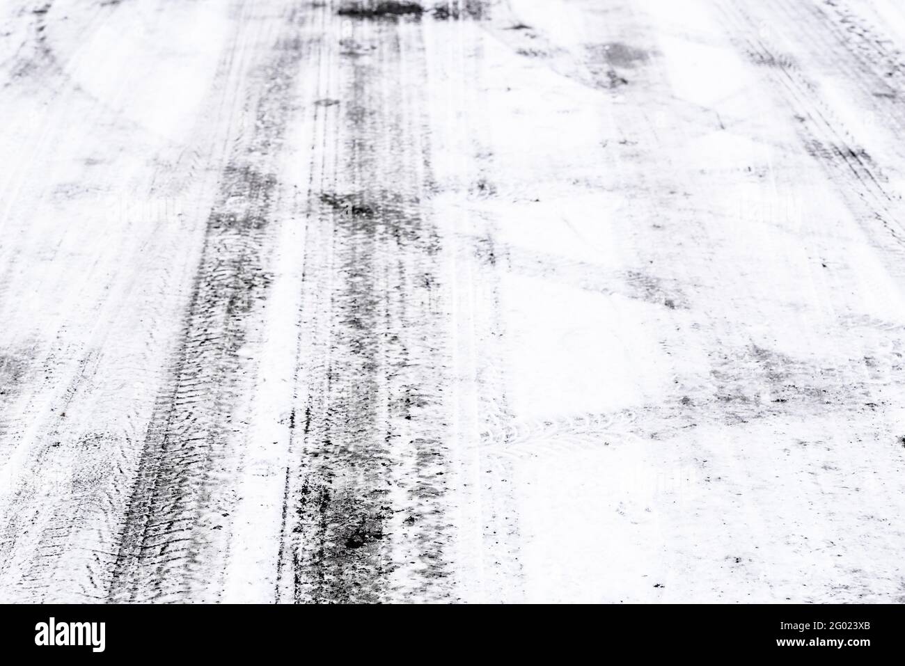 Winter road texture, tire tracks in snow Stock Photo - Alamy