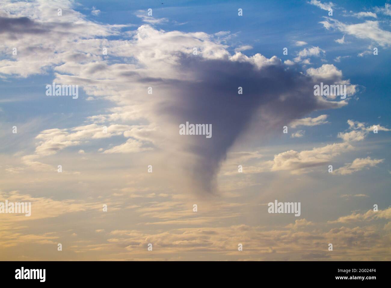 white clouds and blue sky. cloud in a triangle shape Stock Photo - Alamy