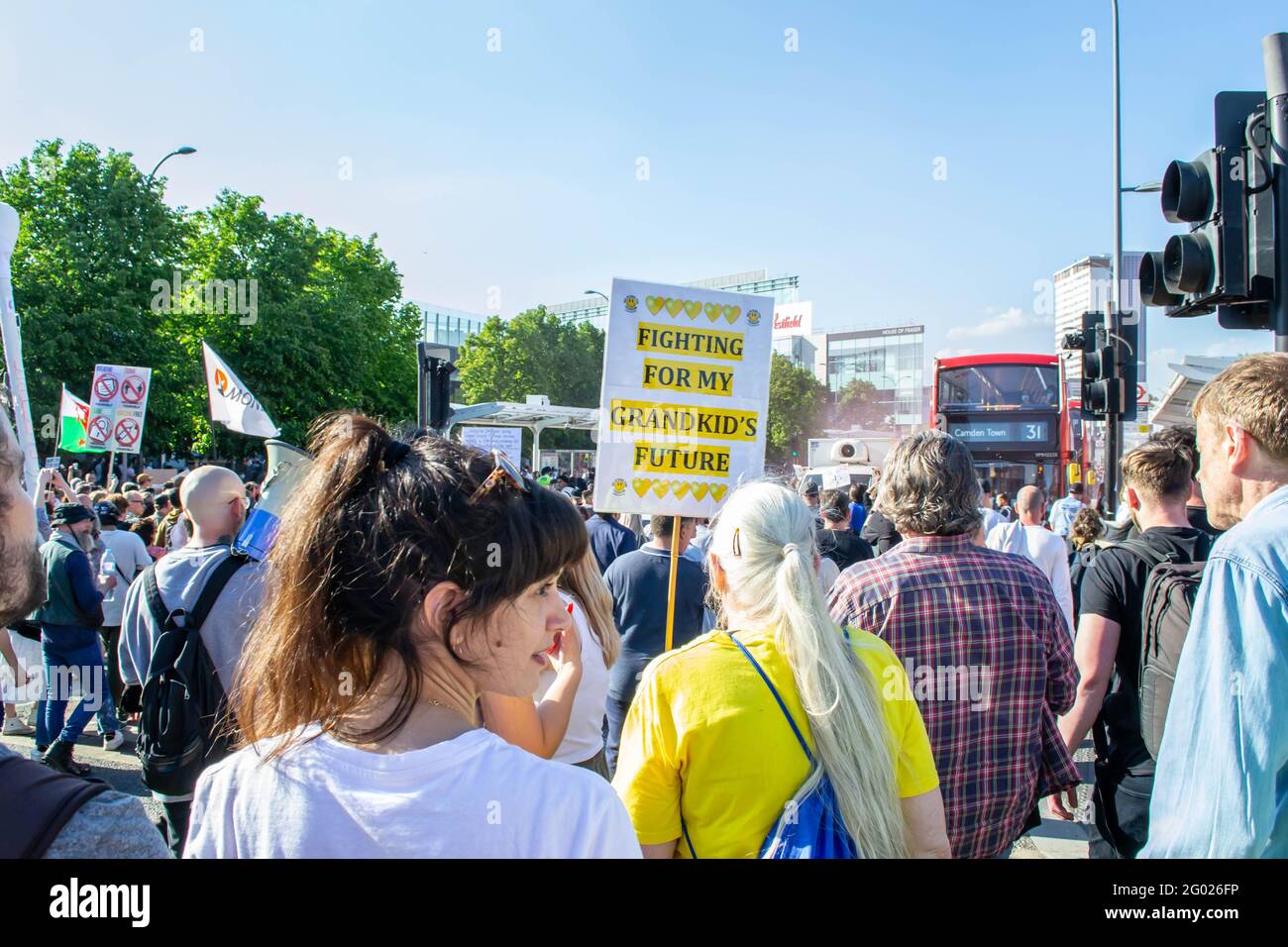 WHITE CITY, LONDON, ENGLAND- 29 May 2021: Protesters approaching Westfield White City during a Unite For Freedom anti-lockdown protest in London Stock Photo