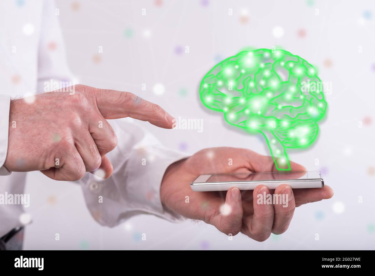 Artificial intelligence concept above a smartphone held by a man Stock ...