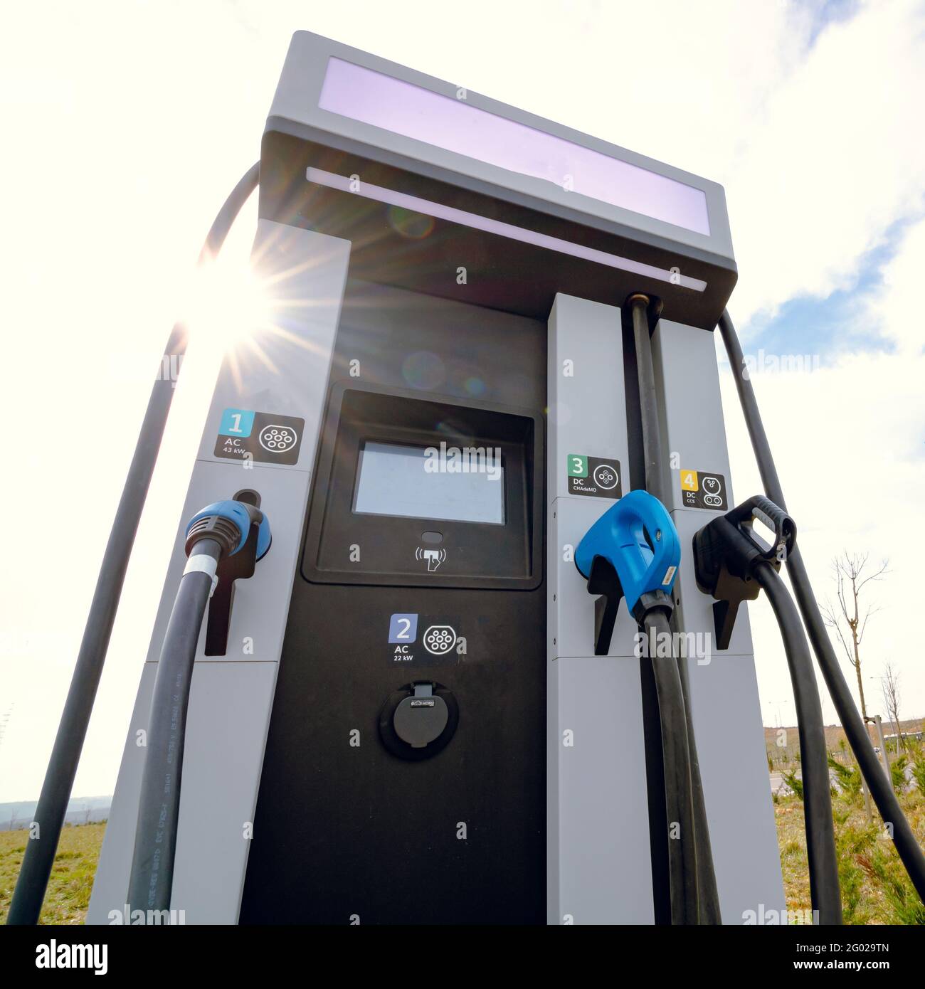 EV charging station with different types of chargers Stock Photo Alamy