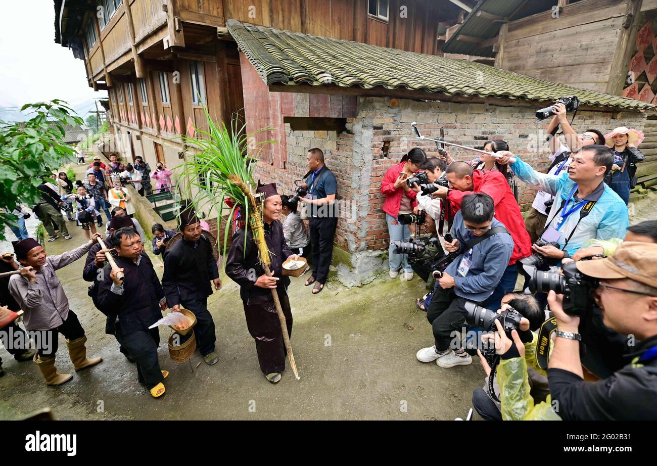 May 29, 2021, Congjiang, Congjiang, China: On May 29, 2021, the Jiabang Terraced Field Scenic Spot in Congjiang County, Qiandongnan Miao and Dong Autonomous Prefecture, Guizhou Province, held the first ''Rice-planting Festival''. Hundreds of Miao villagers gathered in the terraced fields in Jiaye Village, Jiabang Township, Congjiang County. A grand ceremony of ''Opening Seedling Festival'' was held in the past to welcome the arrival of the year when the seedlings are planted. Credit: ZUMA Press, Inc./Alamy Live News Stock Photo