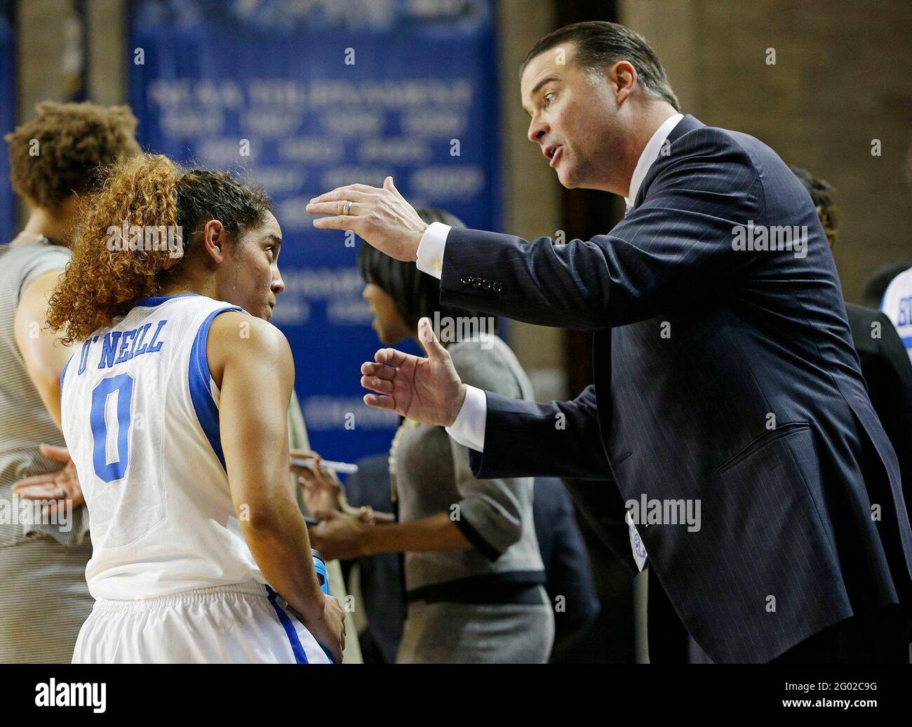 In this file photo from March 24, 2014, Kentucky head coach Matthew Mitchell talks with guard Jennifer O'Neill (0) during a timeout in the second round of the NCAA Tournament at Memorial Coliseum in Lexington, Kentucky. (Photo by Amy Wallot/Lexington Herald-Leader/TNS/Sipa USA) Stock Photo
