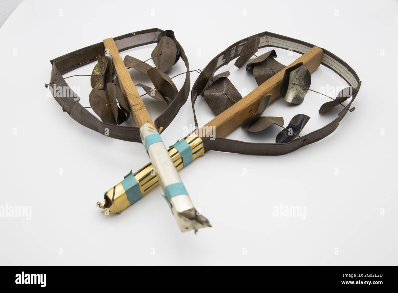 Ancient rattle or tambourine percussion musical instruments isolated on