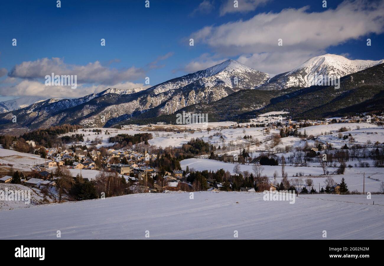 Pyrénées Orientales mountains seen from Mont-Louis village in a winter snowy day (Pyrenees Orientales, Occitanie, France) Stock Photo