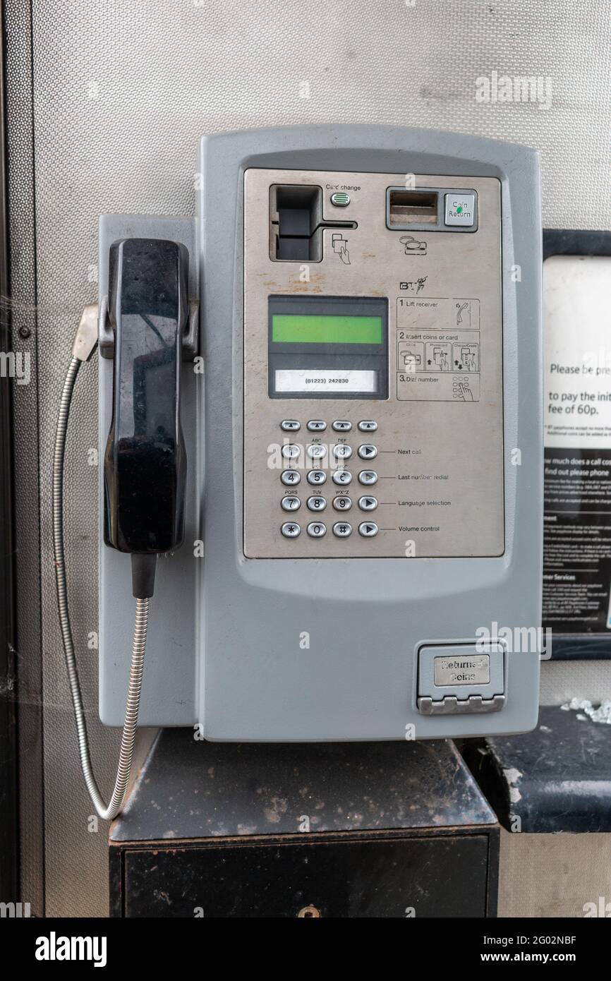 A scruffy British public pay phone on Cherry Hinton Road, Cambridge, UK Stock Photo Alamy