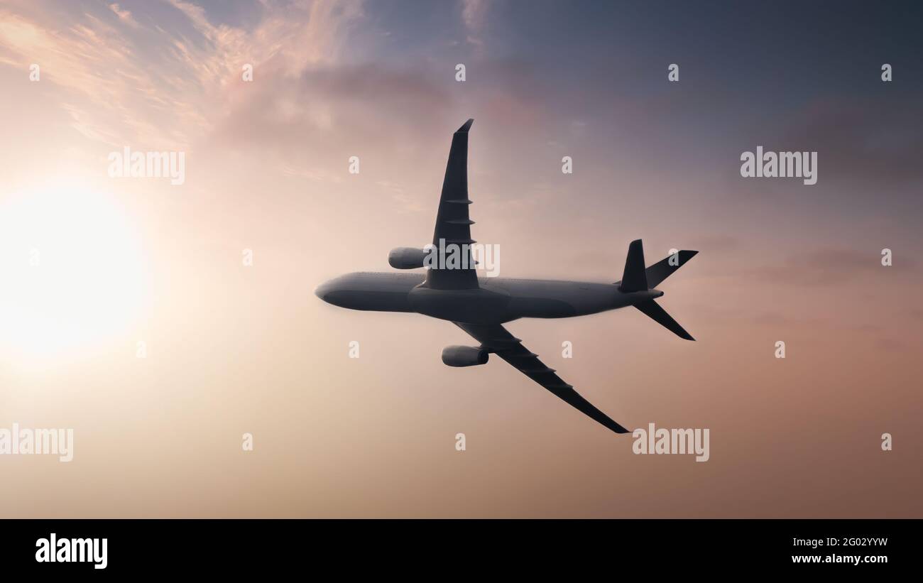 Airplane in the sunset Stock Photo