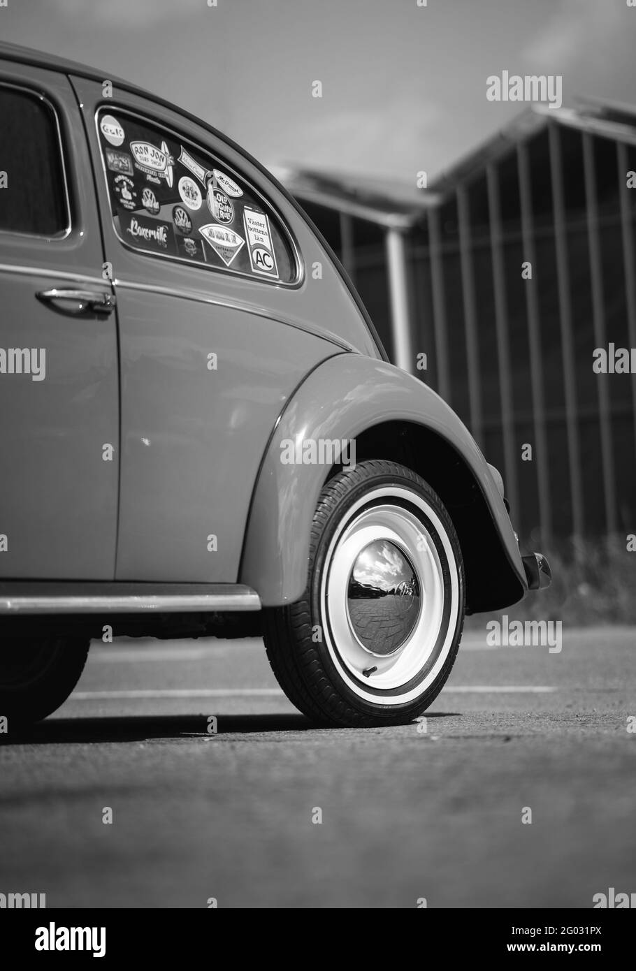 ZOETERMEER, NETHERLANDS - May 20, 2021: Retro car Volkswagen Beetle black and white shot of a rear wheel. Stock Photo