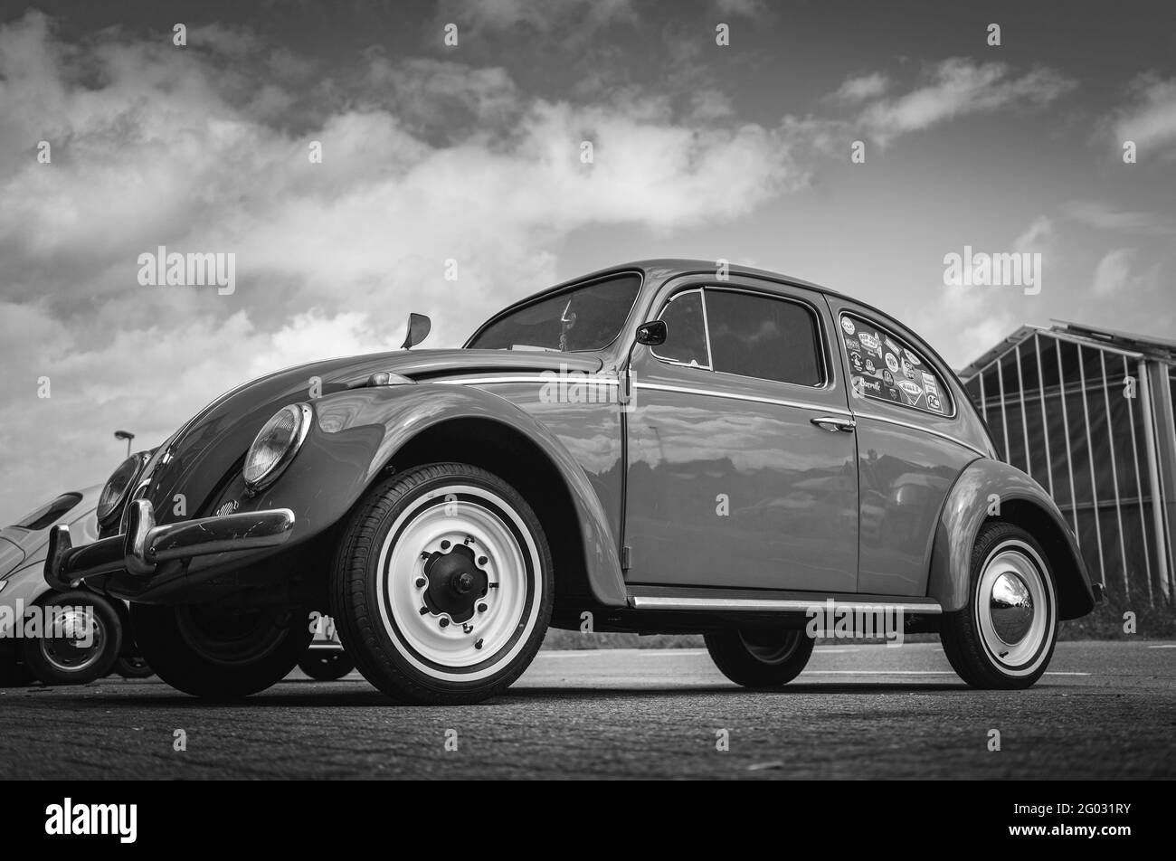 ZOETERMEER, NETHERLANDS - May 20, 2021: Retro car Volkswagen Beetle low to the ground black and white shot Stock Photo