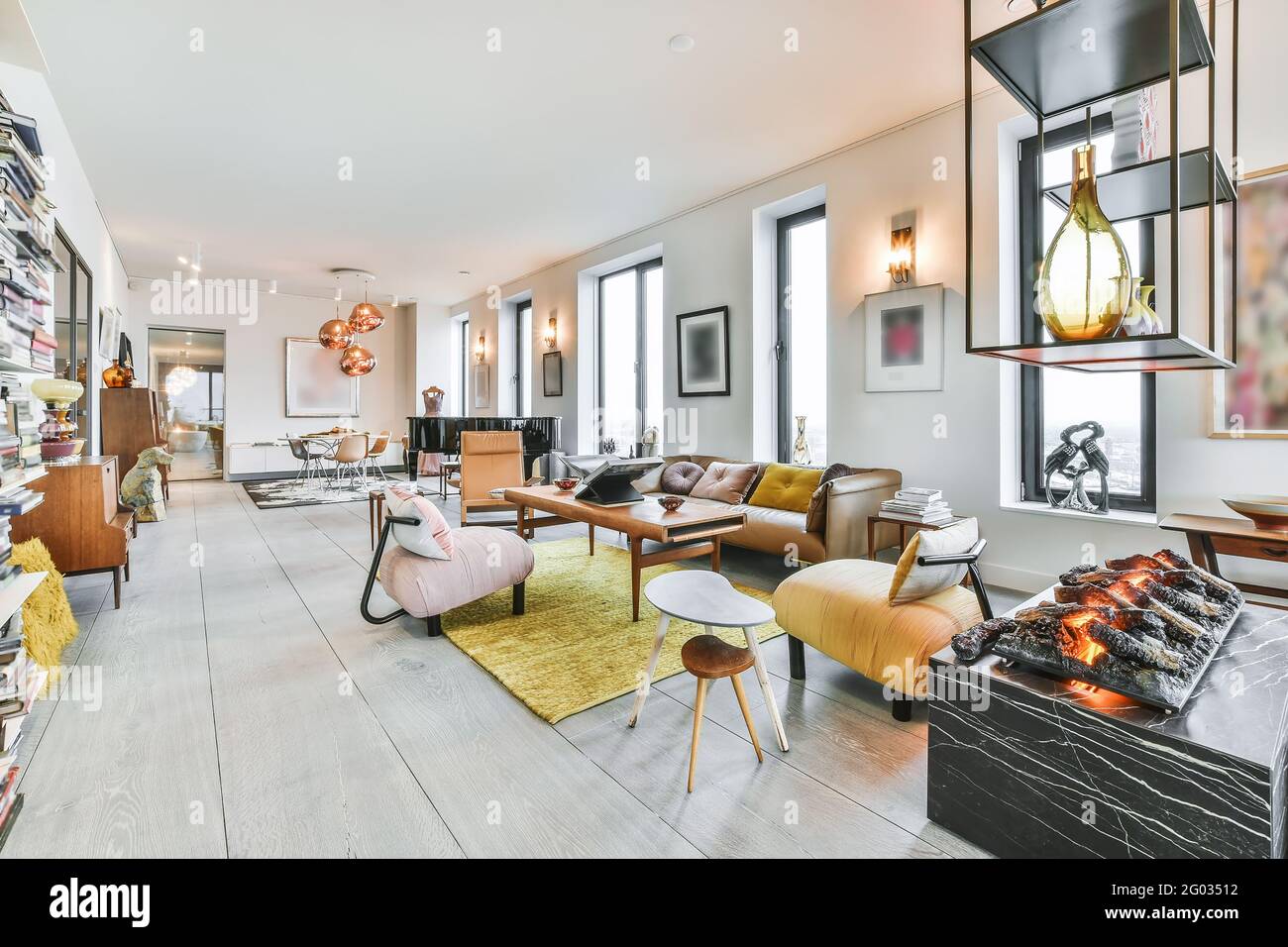 Stylish interior design of living room with elegant furniture and soft ...