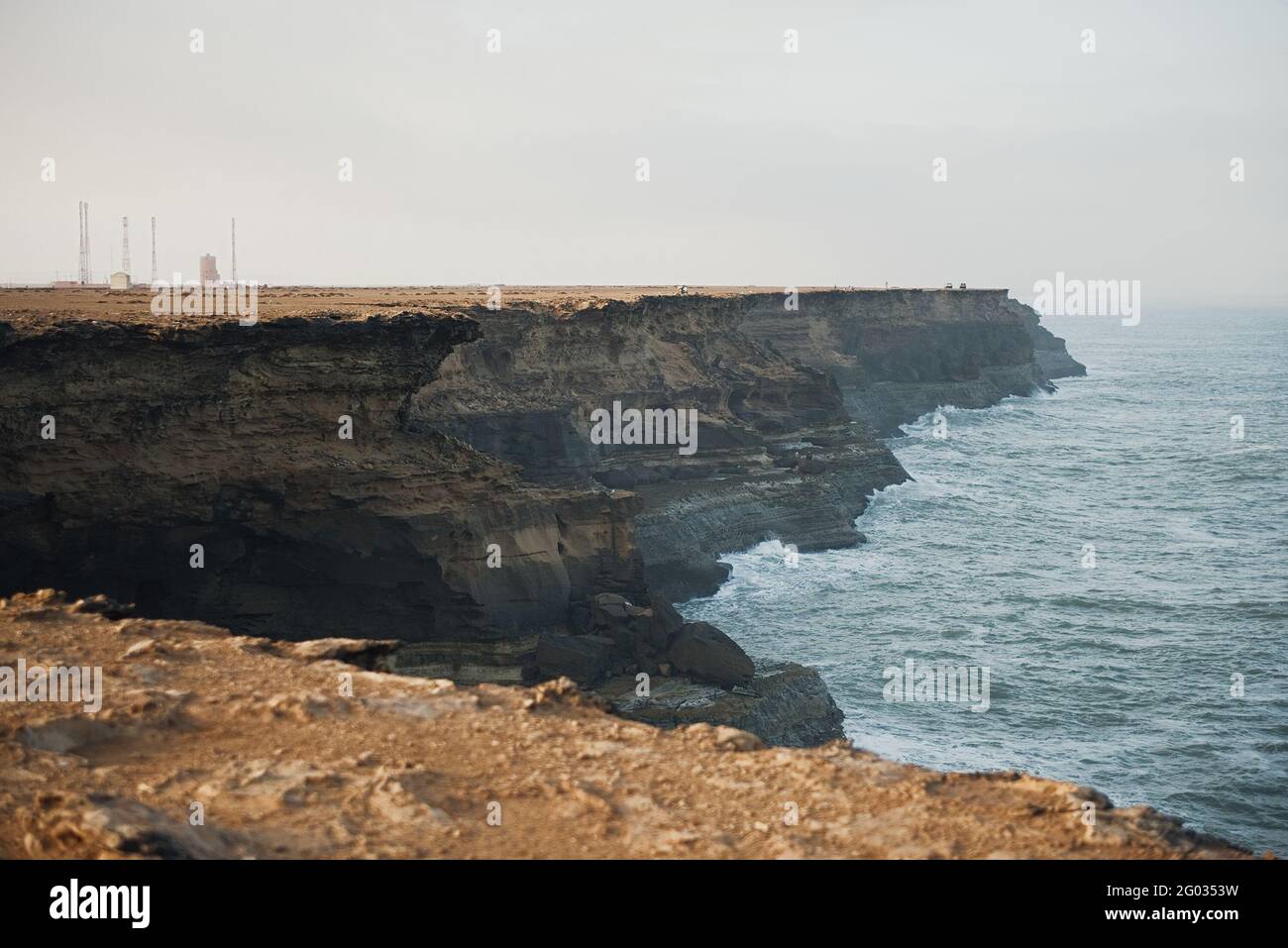beautiful rugged coastline with waves crashing against the cliffs Stock ...