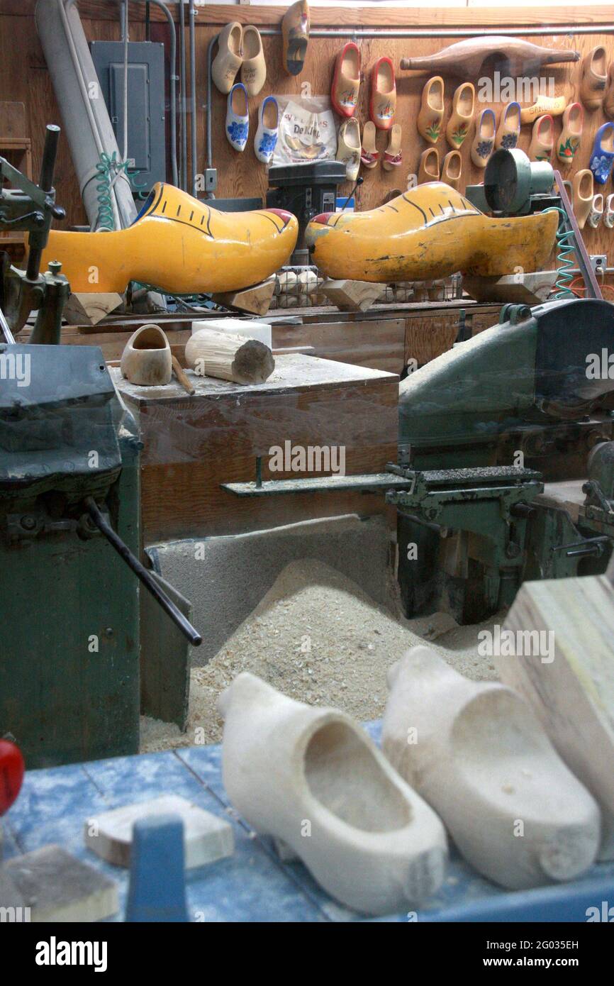 Holland, MI, USA. Inside the De Klomp Wooden Shoe and Delft Factory, making traditional Dutch wooden shoes. Stock Photo