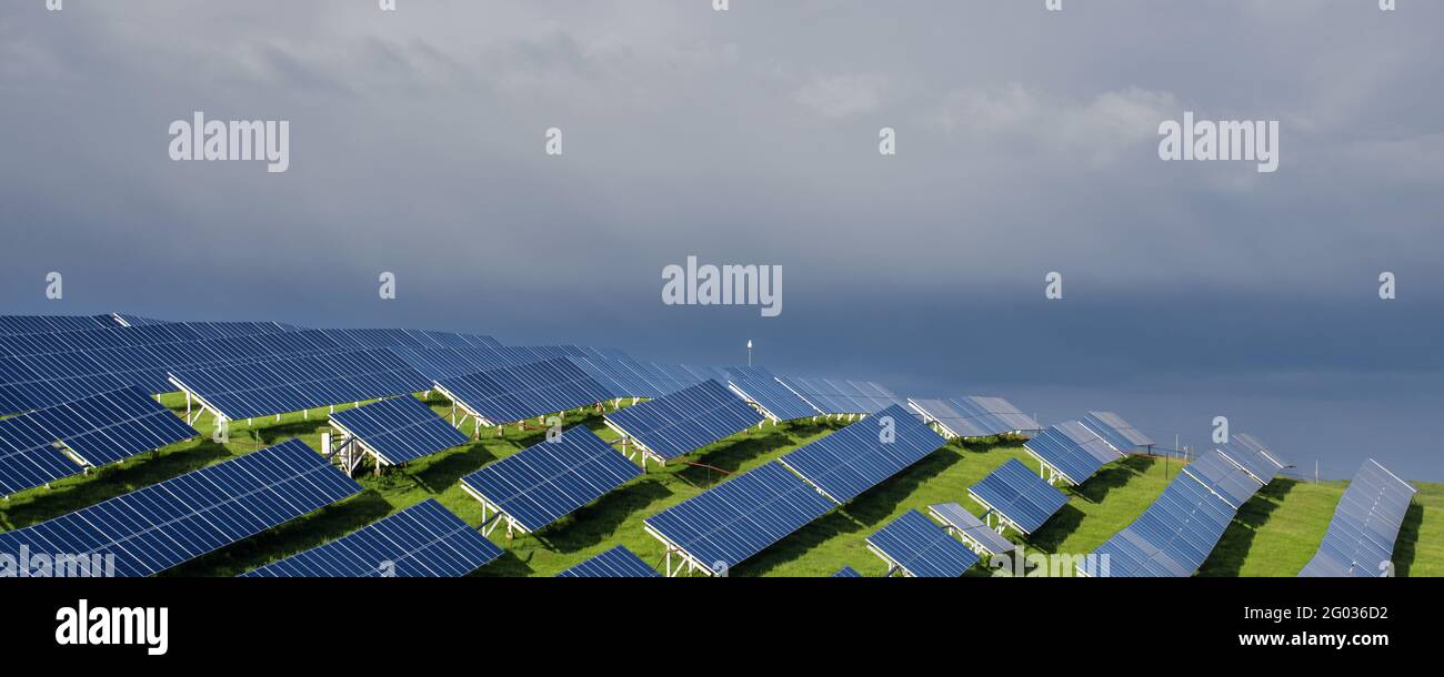 Solar power station with blue sky on background Stock Photo - Alamy