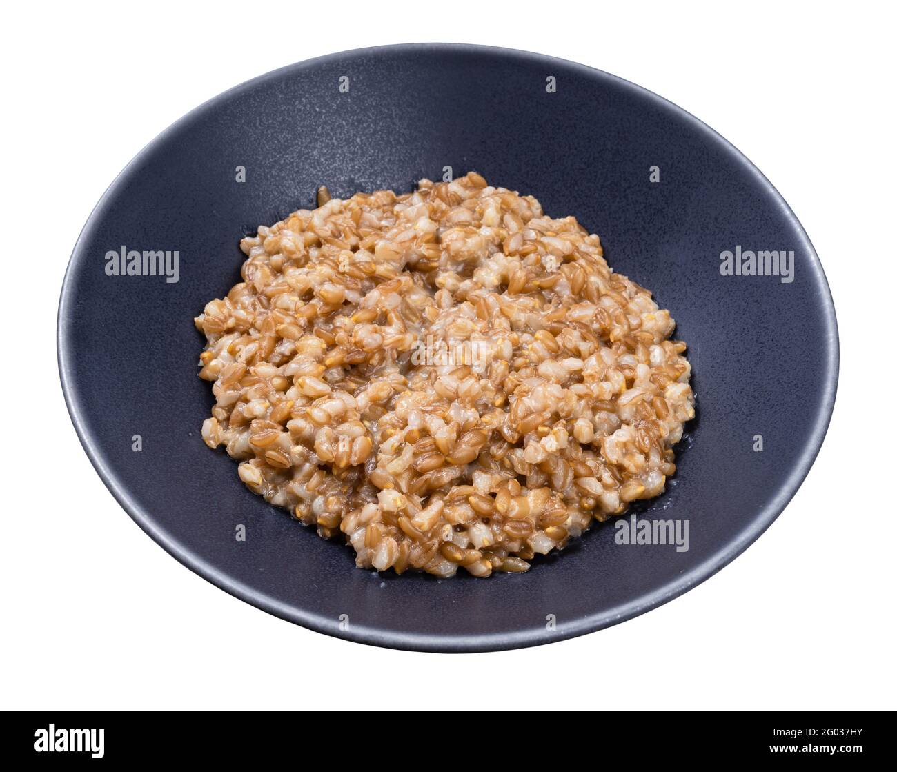 porridge from whole-grain Emmer farro in gray bowl isolated on white background Stock Photo