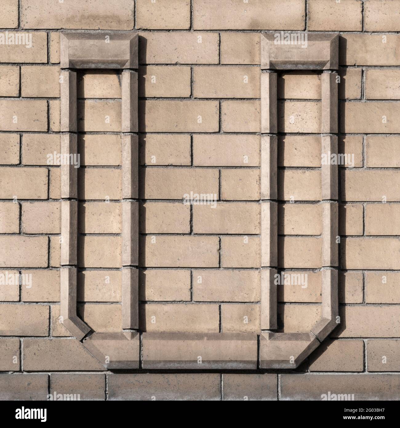 Large letter U composed of light clinker Stock Photo