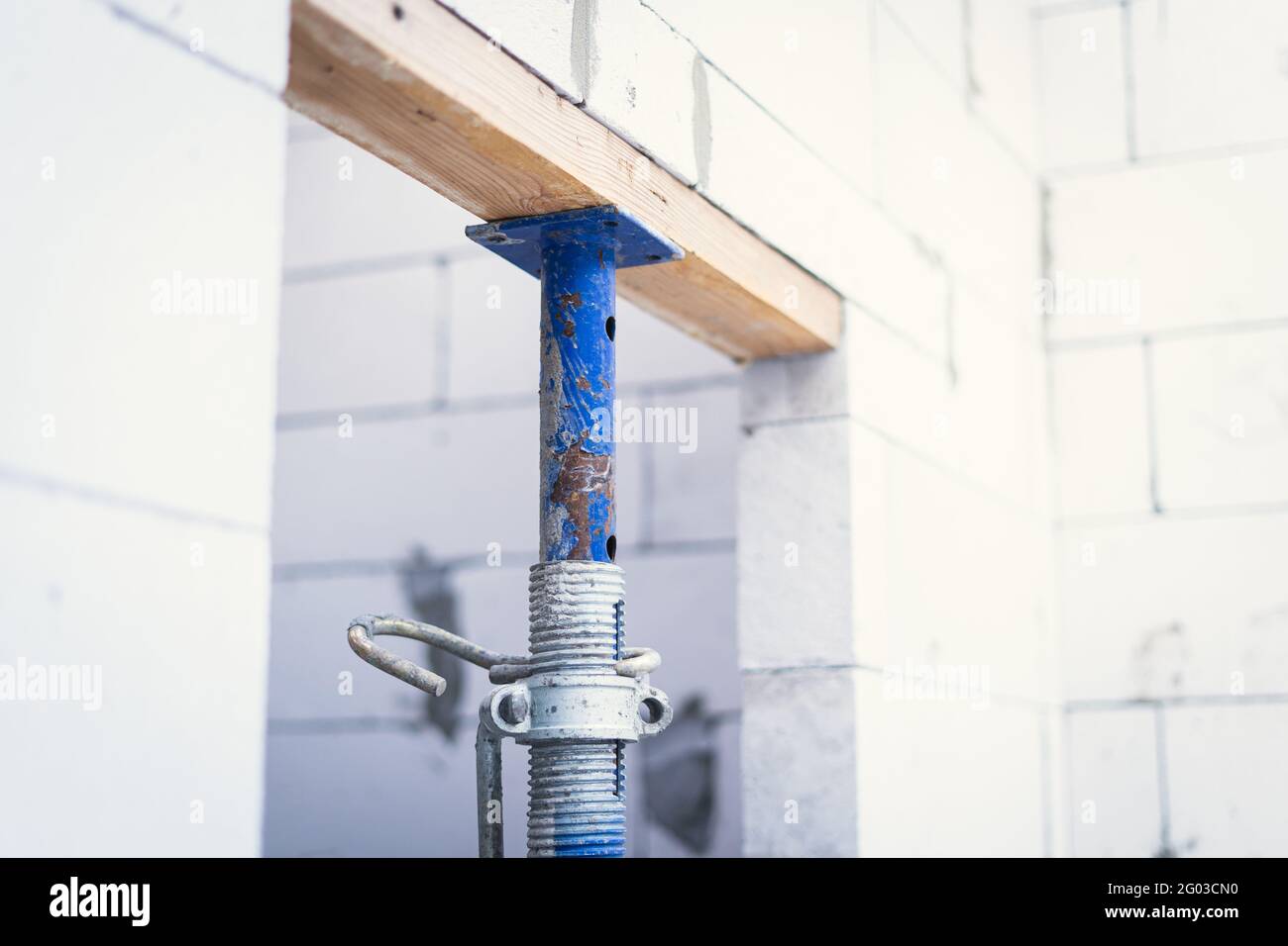 Telescopic building strut in the doorway when building a wall Stock