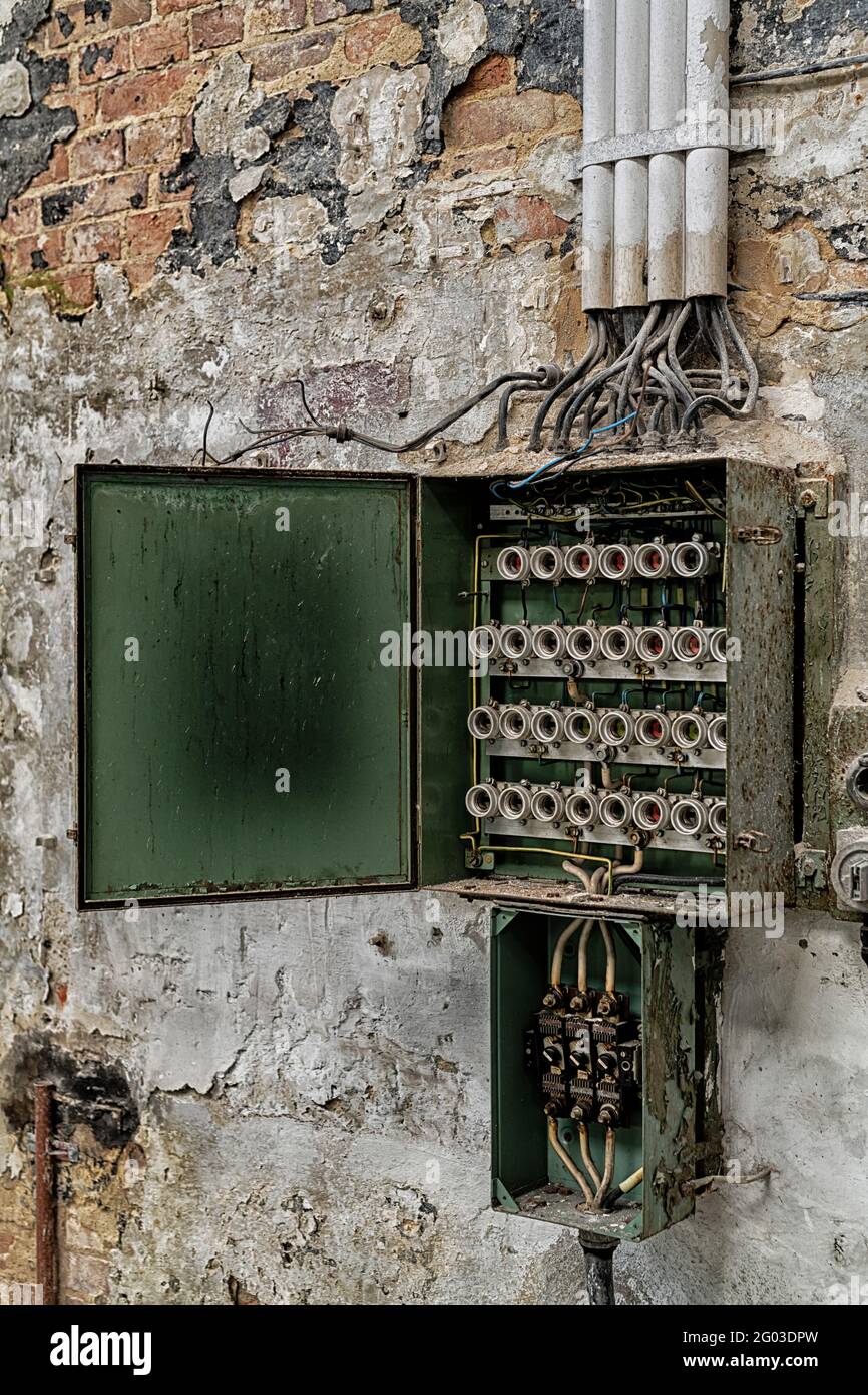 Old fuse box in a dilapidated building Stock Photo