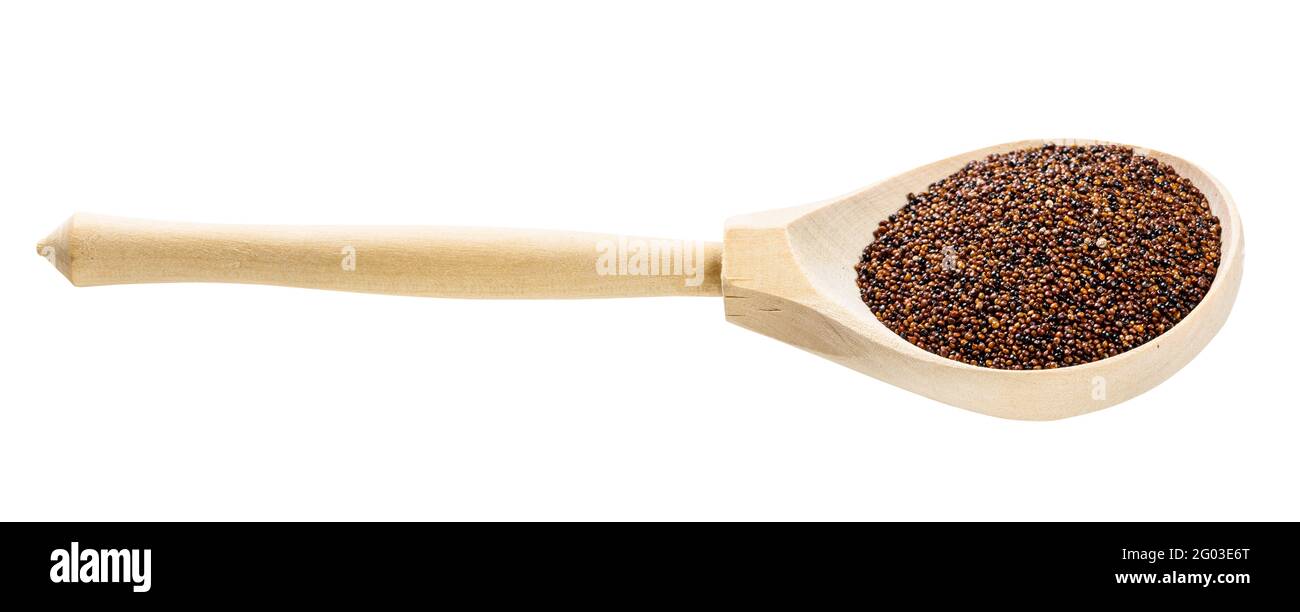 wooden spoon with raw canihua grains isolated on white background Stock Photo