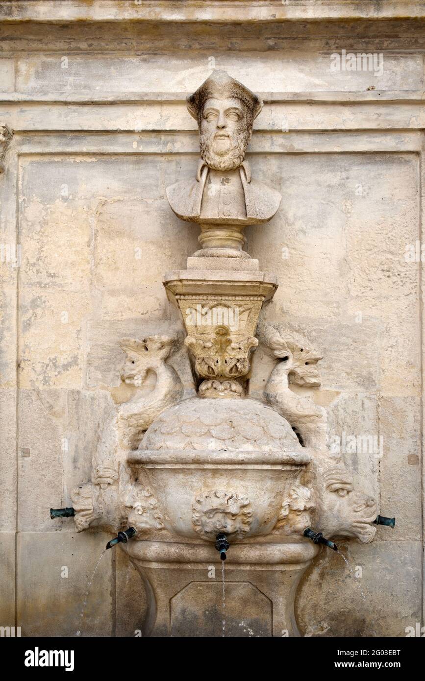 Bust Statue or Portrait of Nostradamus on the Nostradamus Fountain (1859) by Liotard de Lambesc Saint-Remy-de-Provence Provence France Stock Photo