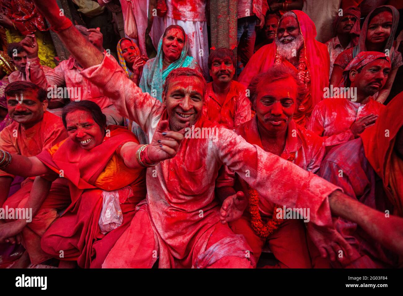Aged Indian Man and woman enjoying Holi festival, the festival of colour in india Stock Photo