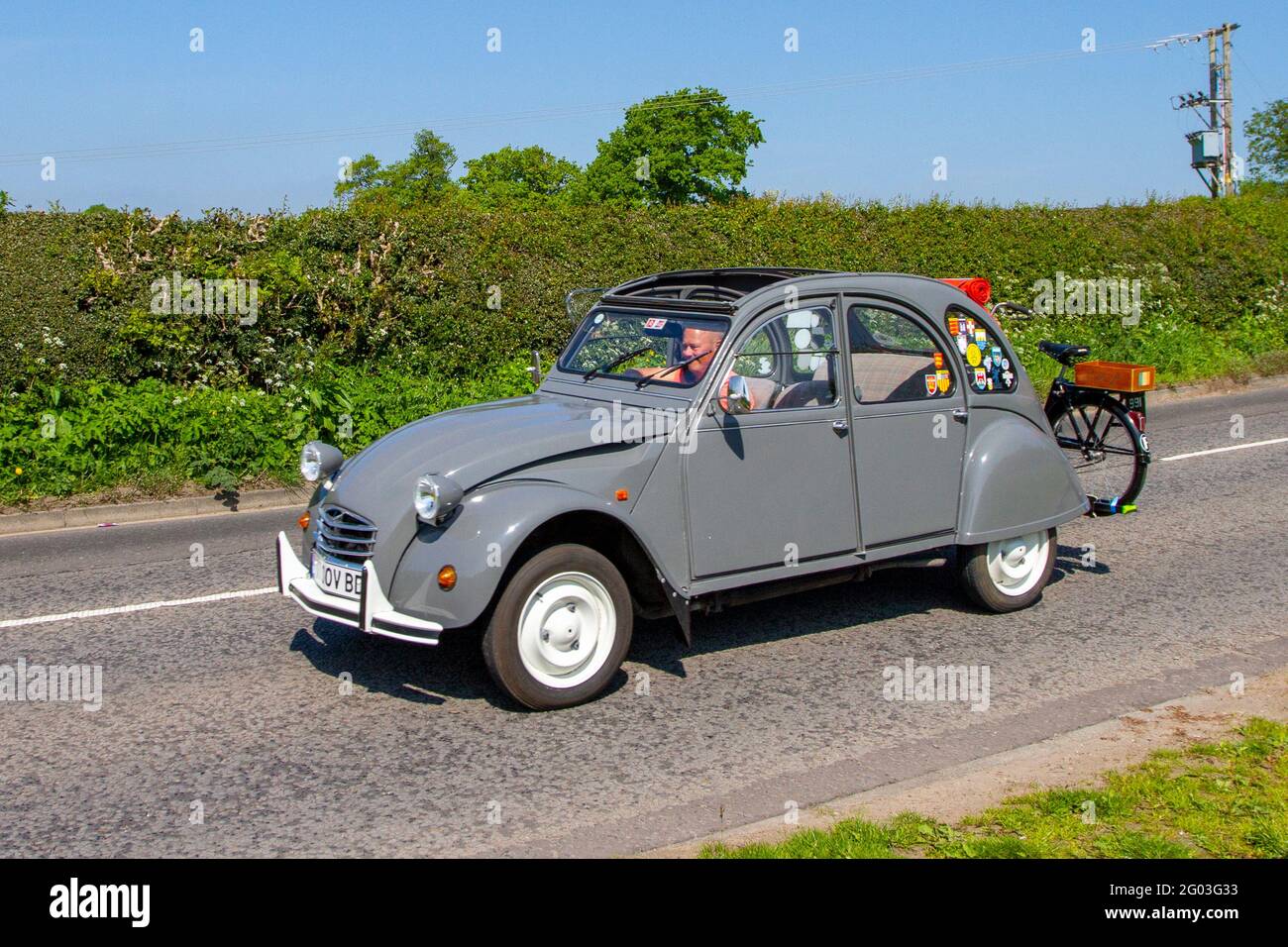 1986 80s grey French Citroen 2 Cv6 Special, 602cc petrol saloon en-route to Capesthorne Hall classic car show, Cheshire, UK Stock Photo