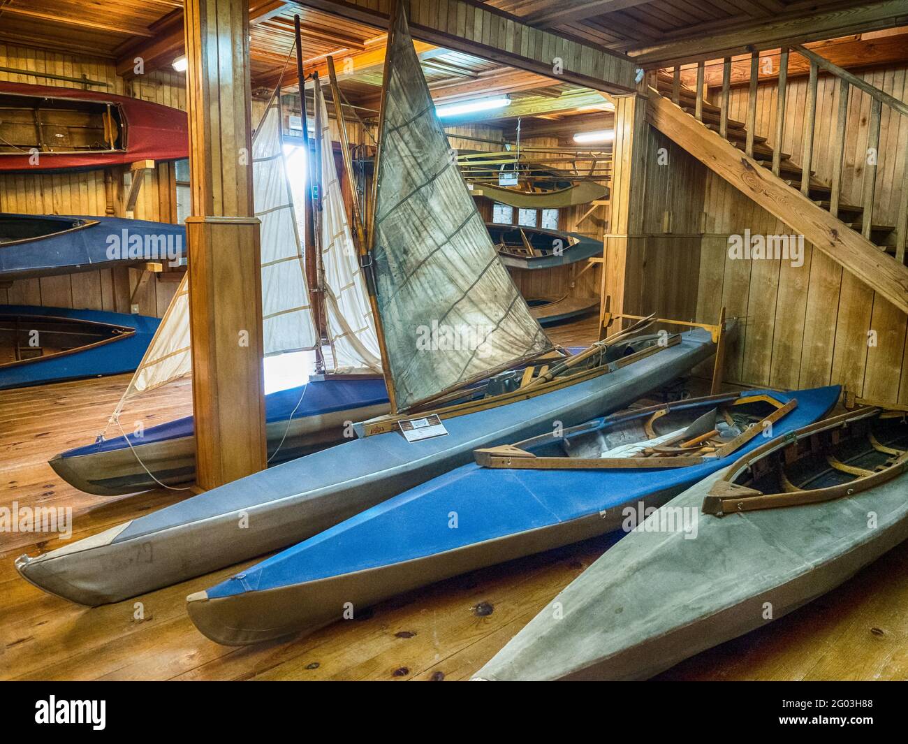 Drohiczyn, Poland - August 2018: Canoe with a sail and other exhibits at the Canoeing Museum in Drohiczyn on the Bug. Podlasie. Podlachia. Poland, Eur Stock Photo