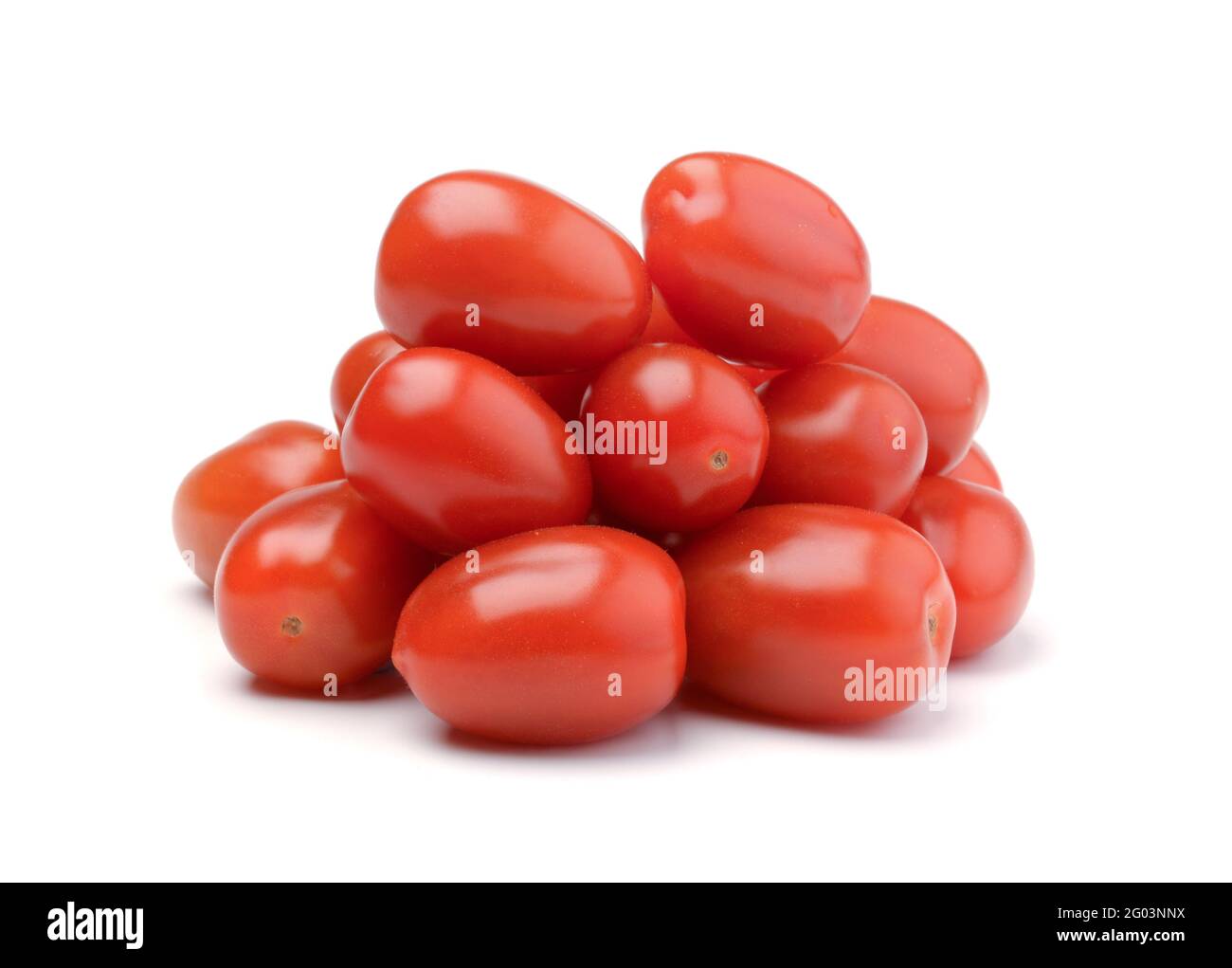 Heap of fresh tomatoes isolated on white. Stock Photo