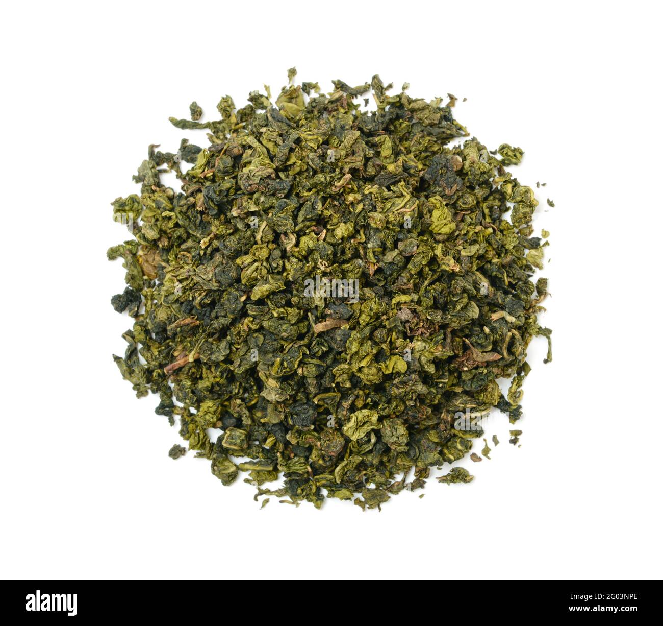 Heap of dry green tea isolated on white. Top view. Stock Photo