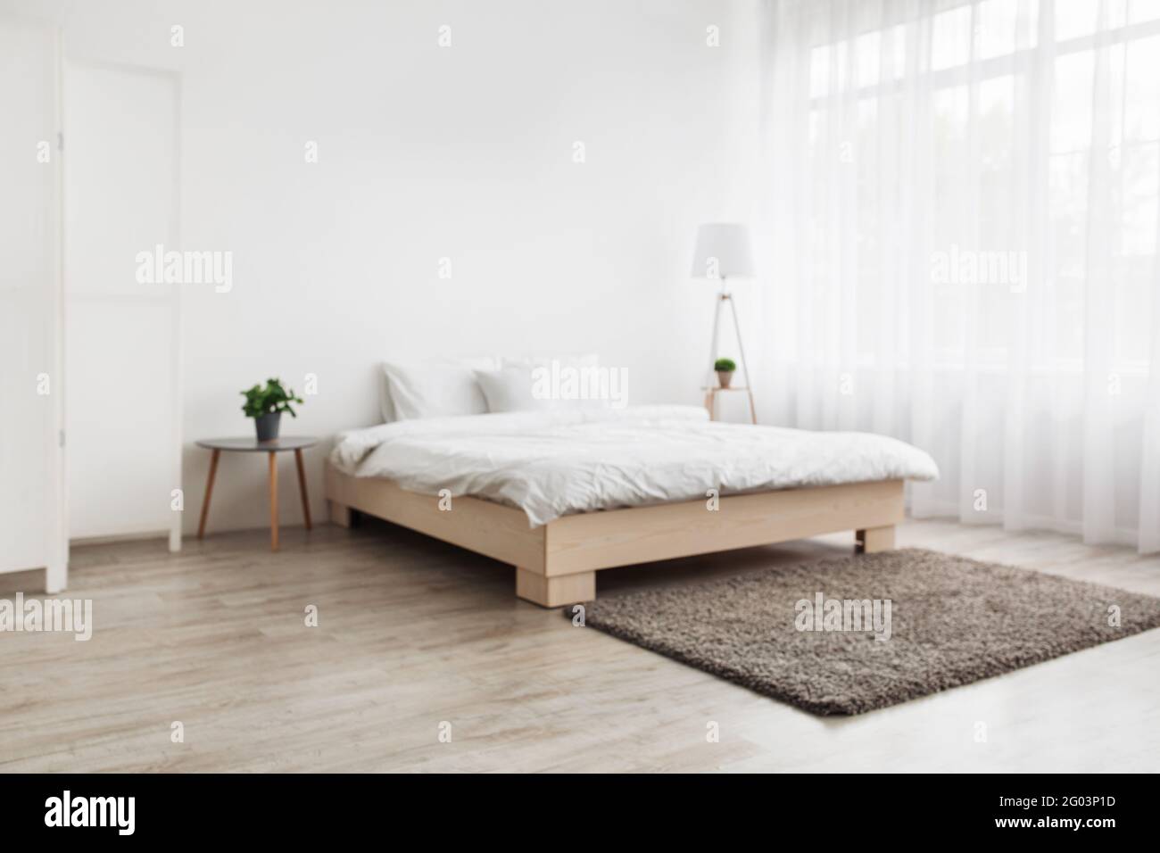 Simple modern bedroom interior, contemporary minimalist design Stock Photo