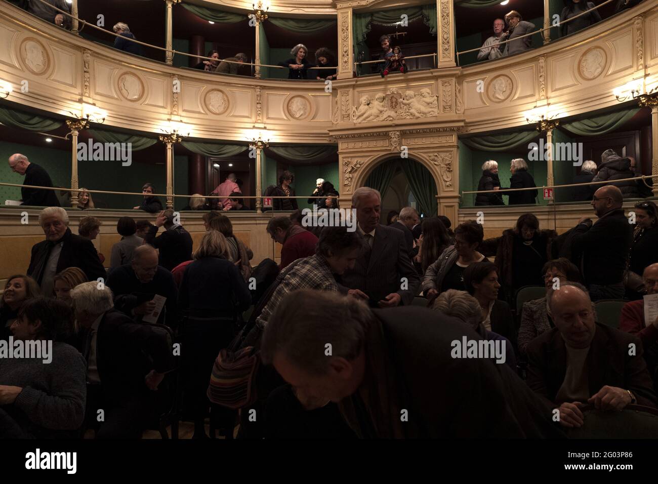 People attend a puppet theater show of the historical milanese Marionette Colla company, at the historical Gerolamo theatre founded in 1868, in Milan. Stock Photo