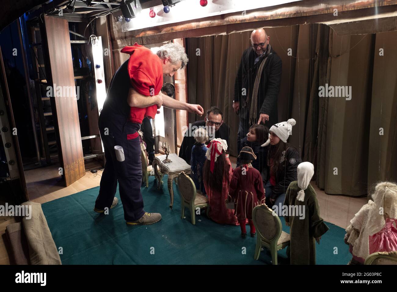 Kids visiting the Marionette Colla backstage, at the milanese Girolamo theater founded in 1868, in Milan. Stock Photo