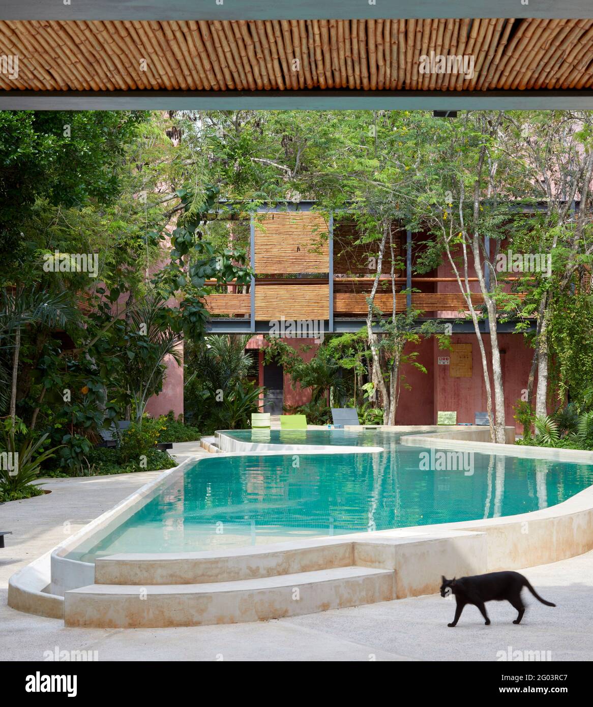 Communal area around pool. Tulum Apartments, Tulum, Mexico. Architect