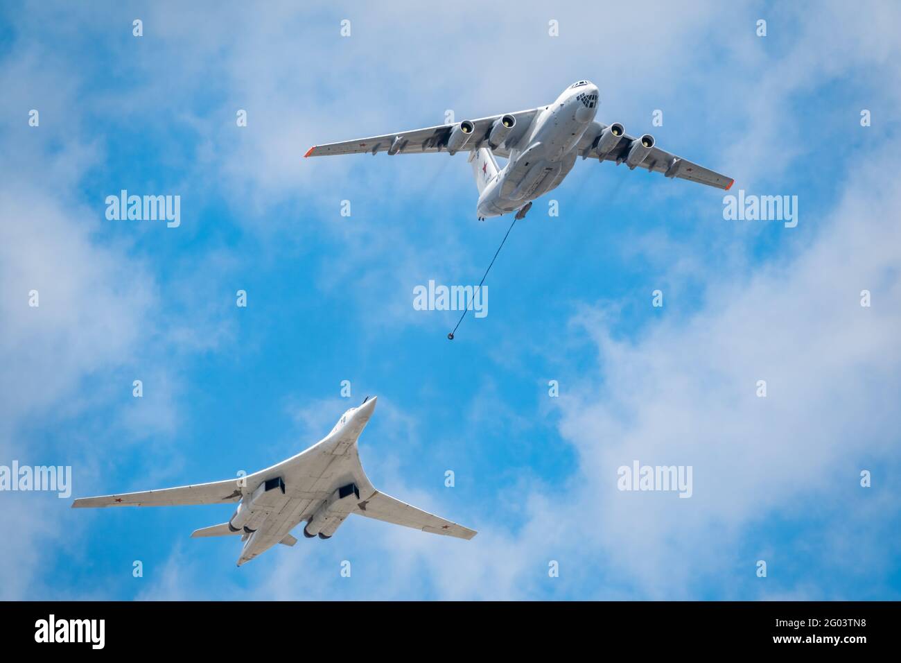 Moscow, Russia - May, 05, 2021: The group of supersonic strategic bomber of long-range aviation Tu-160 and flying tanker Il-78m fly over the Red Squar Stock Photo