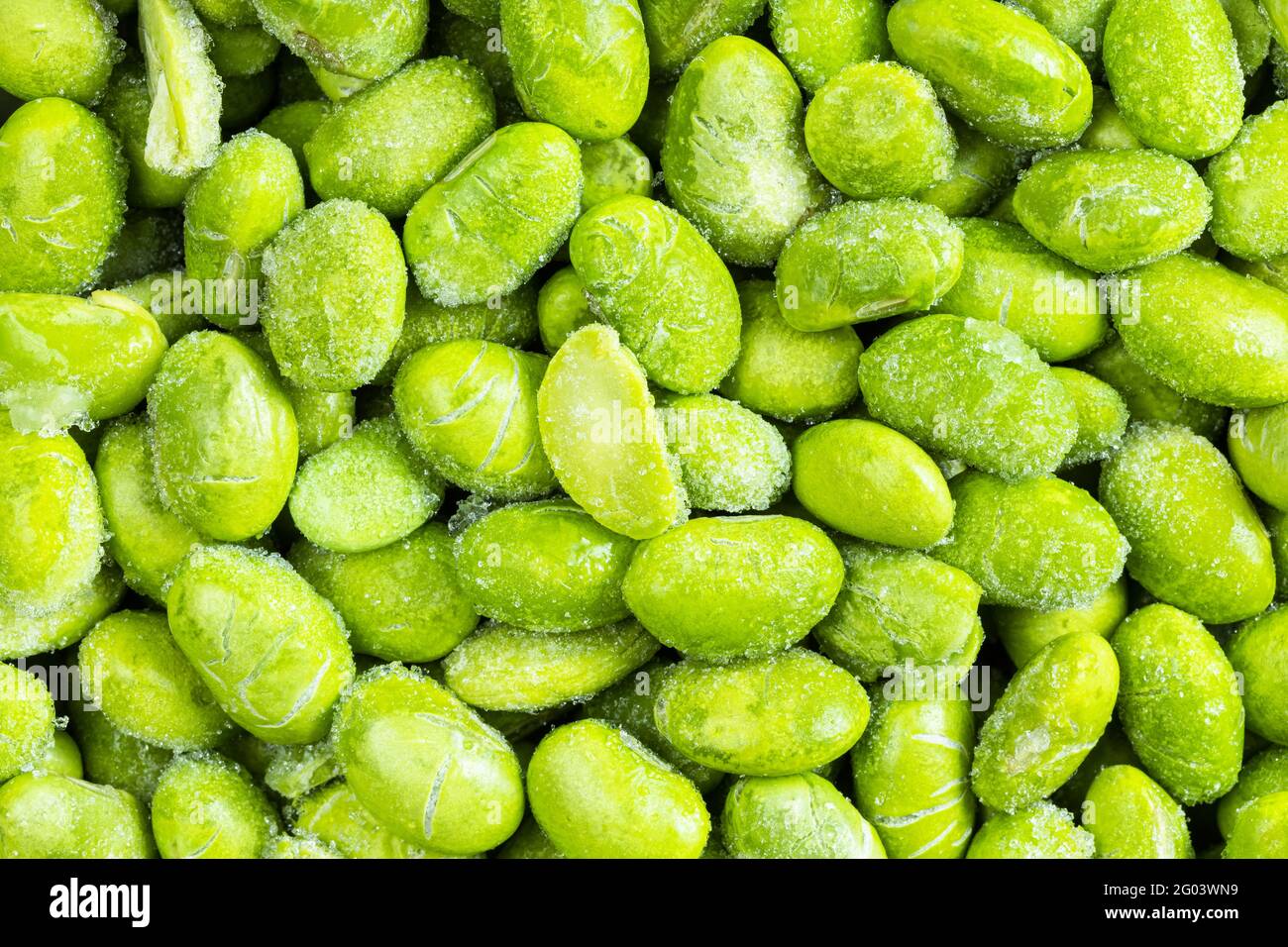 food background many frozen Edamame (unripe soybeans) close up Stock