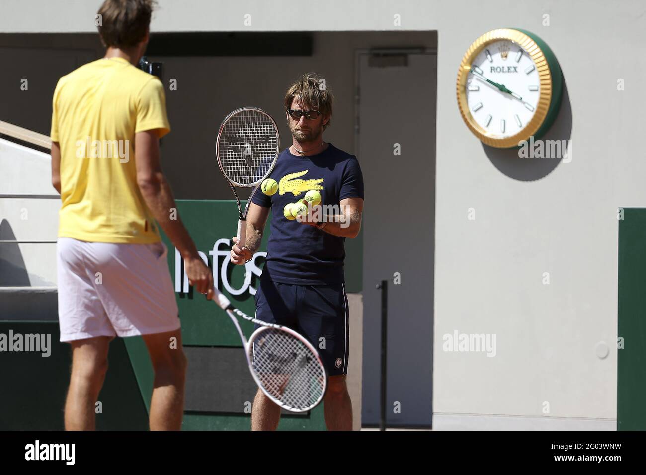 Daniil Medvedev of Russia and his coach Gilles Cervara of France during  practice ahead of the French Open 2021, a Grand Slam tennis tournament at  Roland-Garros stadium on May 29, 2021 in