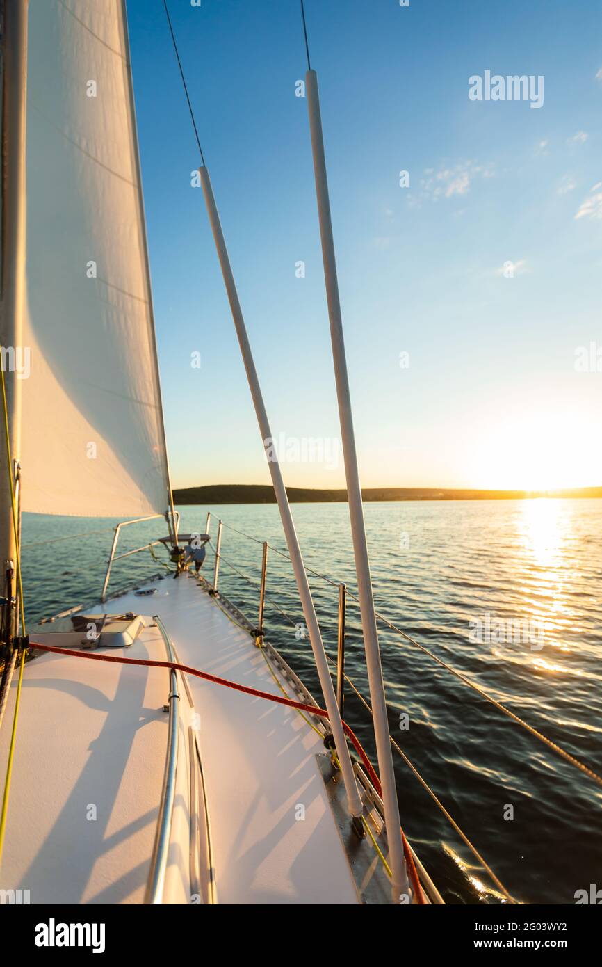 Yacht Sailing In Sea At Sunset On Summer Day, Vertical Stock Photo - Alamy