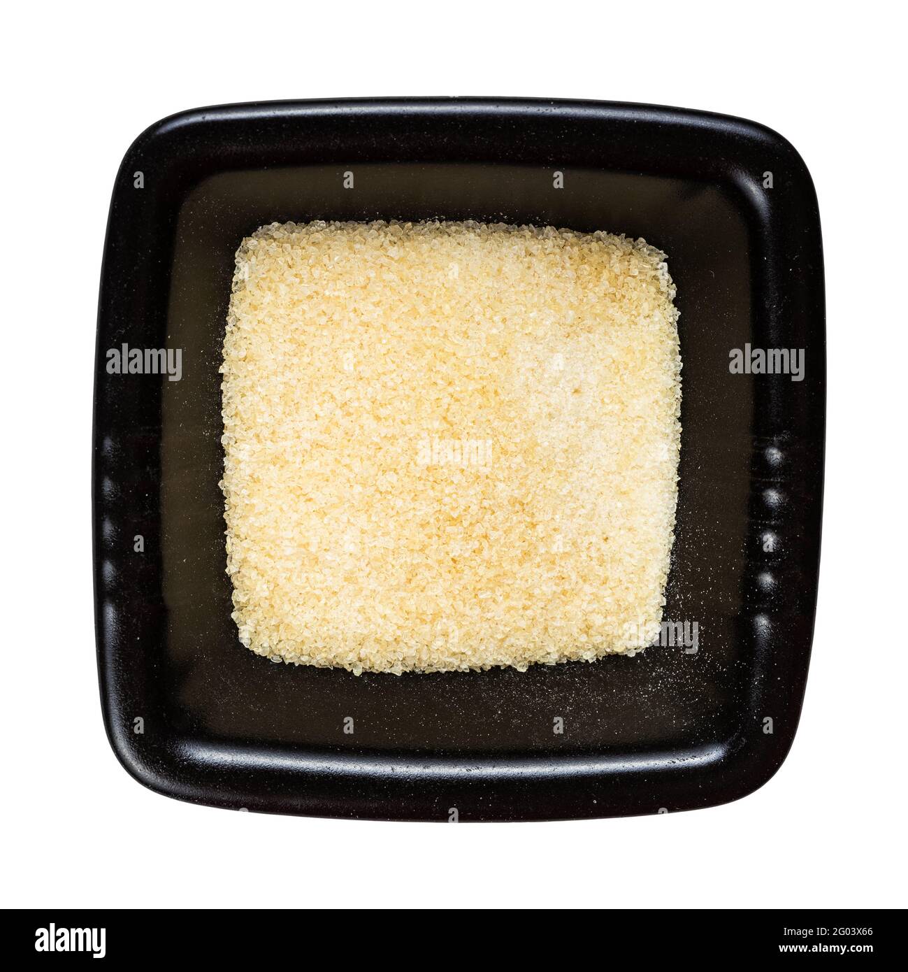 top view of crystalline beef gelatine in black bowl isolated on white