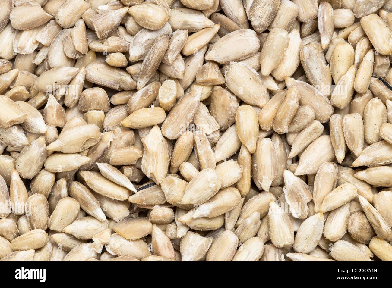 food background many peeled sunflower seeds Stock Photo Alamy