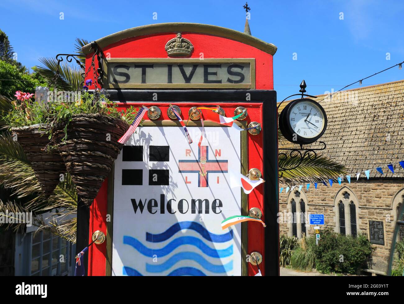 Red phone box in St Ives, decorated to welcome the G7 summit to Cornwall, taking place in Carbis Bay, June 11th-13th 2021, UK Stock Photo
