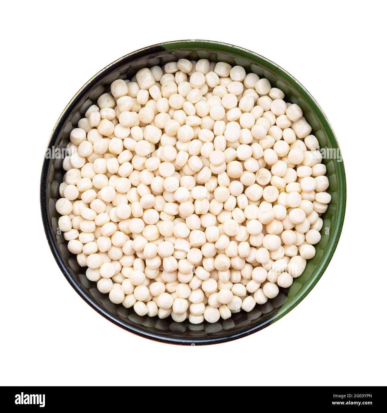 top view of israeli pearl couscous in round bowl isolated on white background Stock Photo