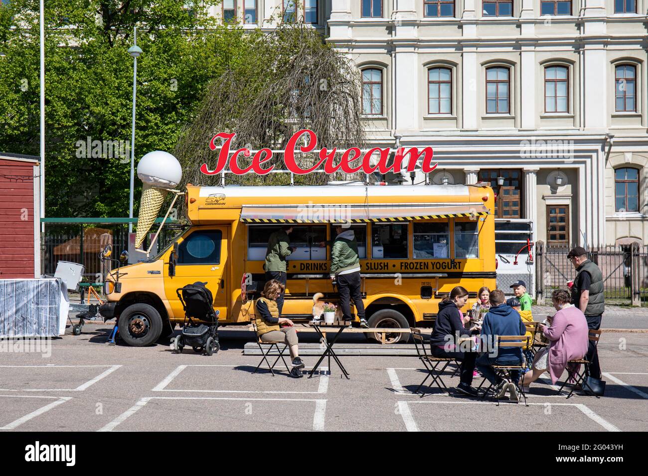 Old school bus turned into a ice cream van at Hietalahti Square in Helsinki,  Finland Stock Photo - Alamy