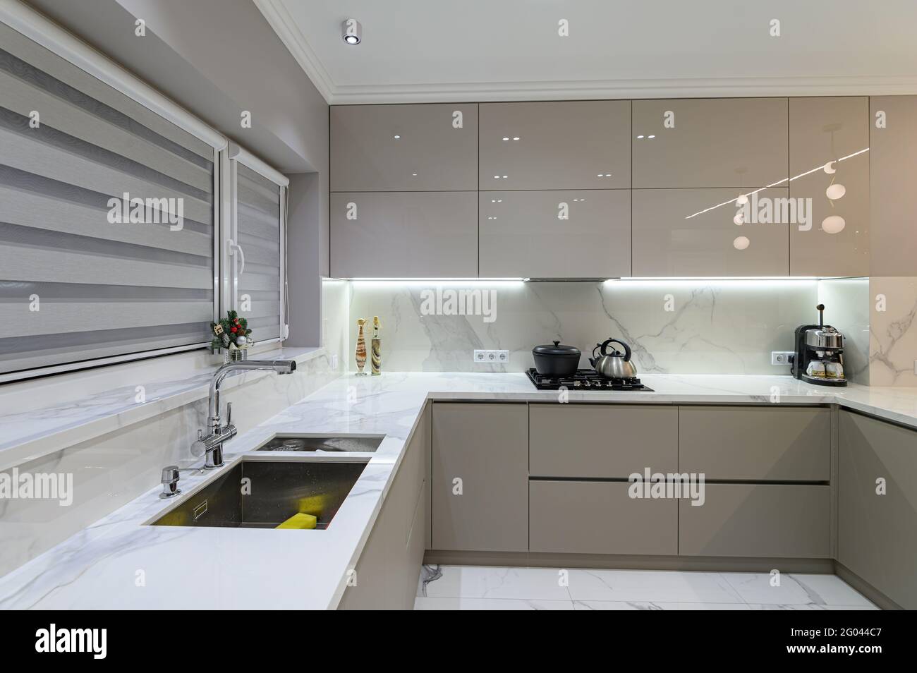 Luxury white modern marble kitchen in studio space Stock Photo Alamy